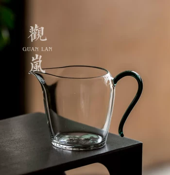 Chinese-Style Heat-Resistant Transparent Glass Fair Cup – Small Household Tea Server with Handle, Thickened Design for Brewing and Filtering Tea