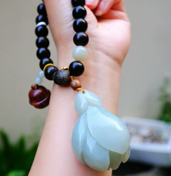 [One Item One Photo] Xinjiang Hetian Jade Qiemo Blue Jade Orchid Hand Piece / Handheld Ornament
