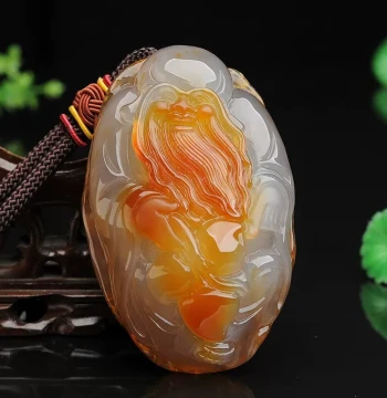 Jade, Chalcedony, and Agate Longevity God Hand-Held Piece, Auspicious 'Ru Yi' Design for Men's Collectible Jade Ornaments