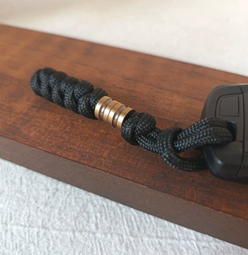 Premium Outdoor Brass Braided Paracord Charm Car Keychain Decor Bag Pendant Anti-Loss Knife Drop Ornament