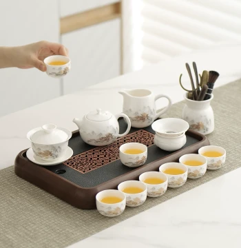 2026 New Mutton Fat Jade Porcelain Tea Set for Home Reception High-End Light Luxury Complete Kung Fu Tea Set Gift