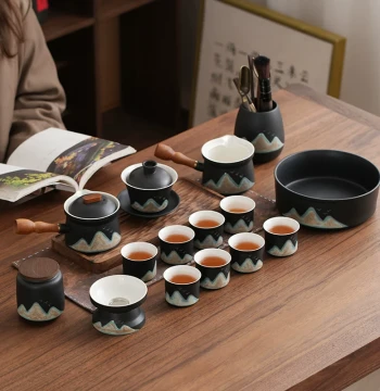 Ceramic Cultural Creative Chinese Style 'A Thousand Li of Rivers and Mountains' Black Pottery Kung Fu Tea Set with Teapot, Gaiwan, and Tea Cups for Home Complete Set