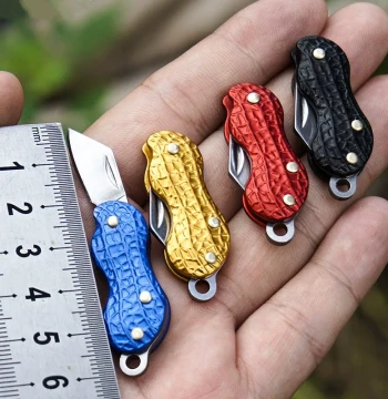 Mini Peanut-Shaped Stainless Steel Folding Knife – Self-Defense Keychain Charm for Package Opening