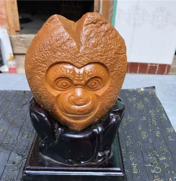 Yunnan Natural Yellow Dragon Jade Seed Material Exquisitely Carved Monkey Wukong Stone-Shattering Ornament with Solid Wood Base and Certificate