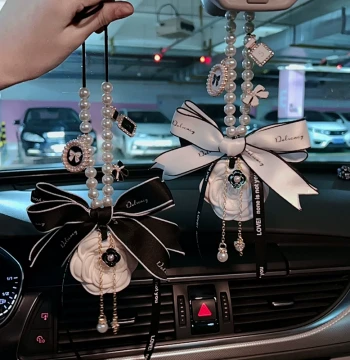 2025 New Premium Car Hanging Ornament: Peace Charm with Diffuser Stone, Camellia Scented Aromatherapy for Women