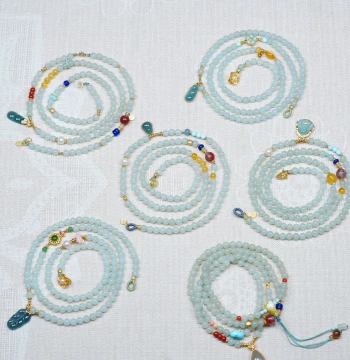 Treasure Ya Lan Collection: Xinjiang Qiemo Milk-Blue Hetian Jade with Blue Sugar Tone, Four-Loop Silver Gold-Plated Designer Hand Necklace Beads