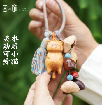 Yunyu Fruit Shell Rattle - Cute Cat Pendant with Tassels, Keychain, Cartoon Bag Charm, and Handcrafted Ornament