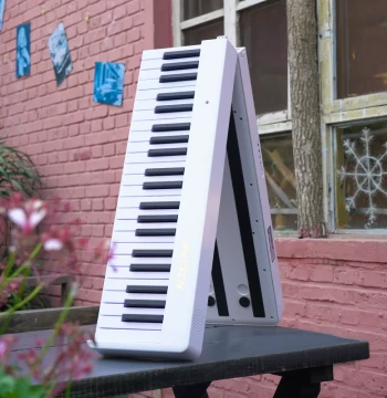 Foldable Piano Keyboard Portable 88-Key Hand-Roll Professional Electronic Piano for Children & Beginners