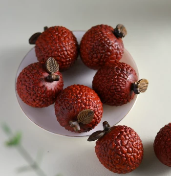 Natural Solid Rosewood Lychee Handheld Ornament with Agarwood Inlay for Office Tea Table