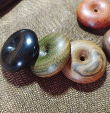 Ebony and Green Sandalwood Peace Buckle Donut-Style Solid Wood Hand Ball for Play and Display