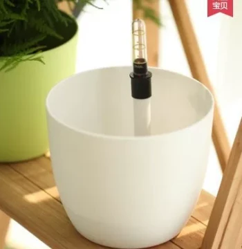 Miracle-Gro Round Resin Plastic Self-Watering Planter with Water Reservoir - Colorful and Free Shipping
