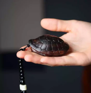 Agarwood 'Wealth Under Heaven' Hand-Held Carved Turtle Shell Ornament for Pocket or Car