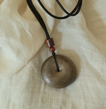 Vietnamese Aged Agarwood Pendant – Subtle Natural Fragrance, Chubby Peace Buckle Design, Minimalist Protective Wooden Jewelry