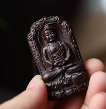 Agarwood Pendant of Mahavairocana Buddha - Unisex Zodiac Guardian Necklace, Carved Amulet, Handheld Piece, and Car Ornament