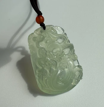 Natural Xiuyan Jade Pendant – Icy Texture Dragon Zodiac Necklace, 'Dragon Soars Across the Seas' Jade Charm