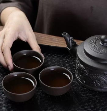 Zisha Kung Fu Tea Set with Celadon, Ge Kiln, and Ru Kiln Ceramics Including Gaiwan, Teapot, and Cups