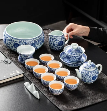 Premium Blue-and-White Porcelain Kung Fu Tea Set with Gaiwan, Teapot, and Cups, Featuring Interlocking Lotus Pattern, Jingdezhen Style for Home Use