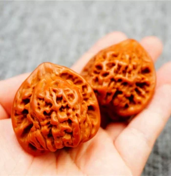 Collectible Peach Pits with Qilin Pattern, Official Hat and Four-Tower Lion Head Varieties, Machine-Brushed Patina Walnut Base
