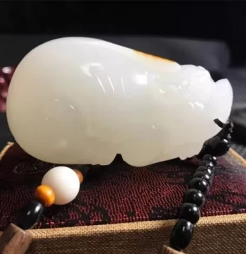 Xinjiang Hetian Colorful Jade Mountain Material White Jade Pixiu Hand Piece, Plaything, and Cultural Artifact for Polishing